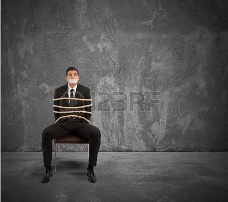 cryptolocker ransomware virus post has a man tied to a chair with his mouth taped shut